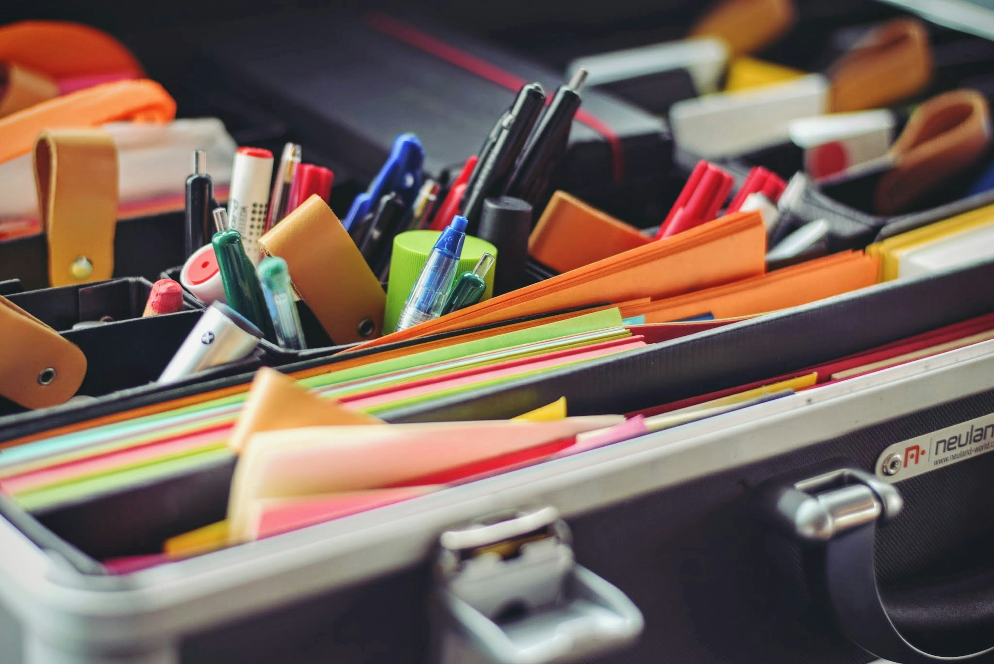 A well-organized desk with stationery supplies.